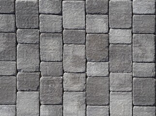 Gray stone block for outdoor flooring and sidewalk.  Close up, front view, background and texture.