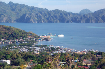 Fototapeta na wymiar Overview of Coron province with mountain and sea during daytime in Coron, Palawan, Philippines