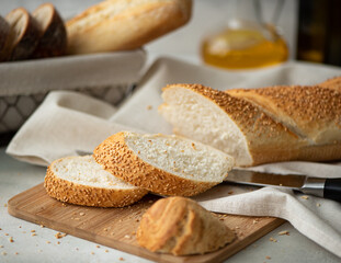 french baguette with sesame seeds chopped into pieces