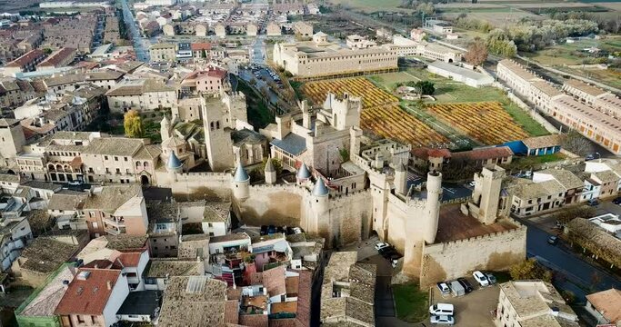 Picturesque autumn landscape of Olite with imposing medieval Palace of Kings of Navarre, Spain
