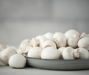 fresh large mushrooms on a plate