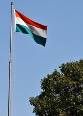 unfurled flag of India in air 