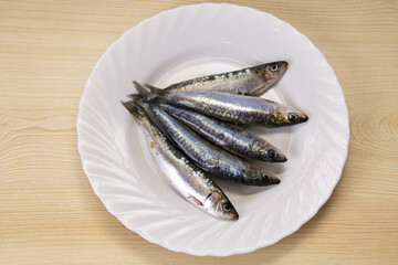 plate of fresh sardines on the plate