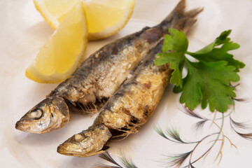 grilled fish, sardines or anchovies with parsley
