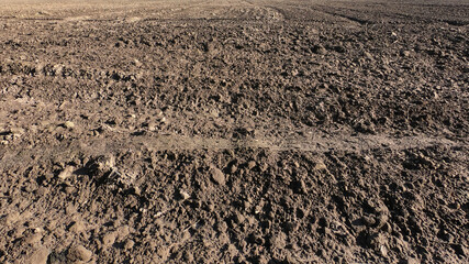 Traces of transport on the soil. Background.