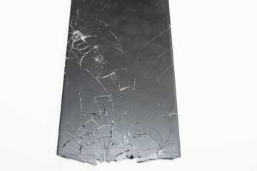 Mobile phone repair. Broken glass screen of a smartphone on a white background