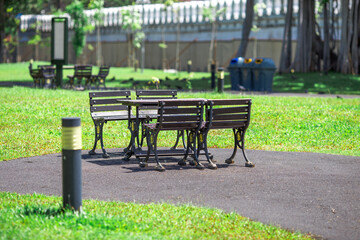 Blurred abstract background view of a chair placed in a park, allowing people to relax during the holidays or exercise during the day