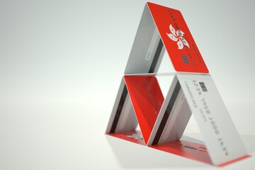 National flag of Hong Kong on credit card house, fictional data. Risky financial decisions related 3D rendering