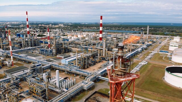 The Chimney With Fire in Oil refinery Gdansk, Poland, Aerial drone. High Quality photo