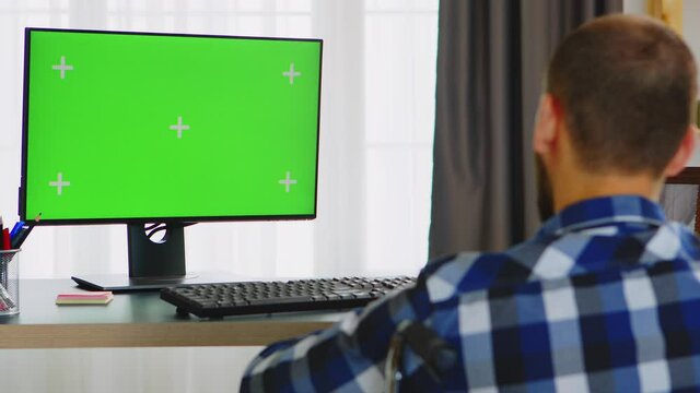 Invalid entrepreneur in wheelchair working from home. Handicapped invalid paralysed freelancer, immobilized entrepreneur working from home, ilness and disability