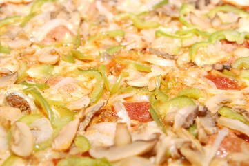 Pepperoni with meat and vegetable toppings pizza pie