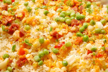 Oriental fried rice meal mix with green peas, ham and vegetables