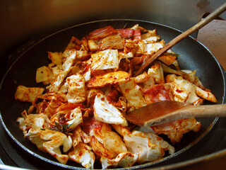 Dak-galbi, or spicy stir-fried chicken, is a popular Korean dish made by stir-frying marinated diced chicken