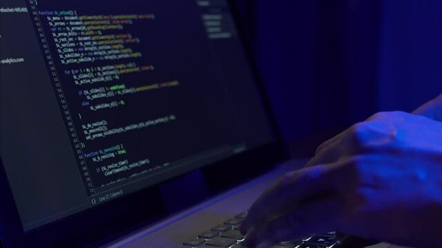 Close-up of the Software Developer Debugger Process. A System Programmer Writes Code.