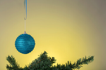 New Year card with Xmas toys and fir branch.