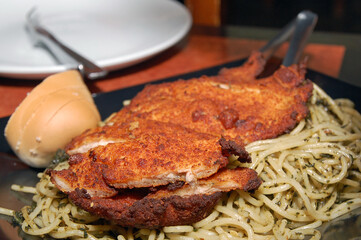 Pesto pasta with grilled chicken meal