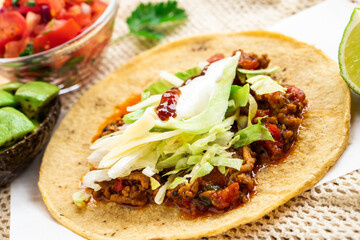 Mexican homemade taco burrito pulled pork with tomato salad  guacamole
