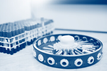 tubes with blood samples in a centrifuge close-up in the chemical and bacteriological laboratory.
