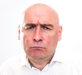 Fototapeta premium portrait of bald adult mature man with emotions on white background