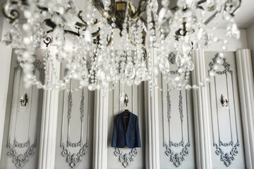 Groom's suit hanging on a hanger