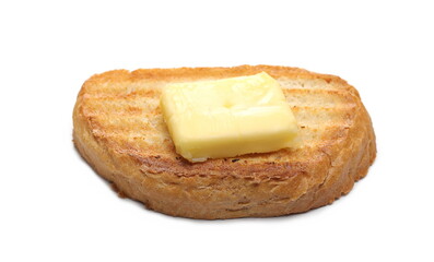 Yellow butter block on toast slice, isolated on white background
