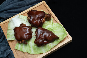 Chinese traditional delicacy marinated pig's feet.Braised pork trotters