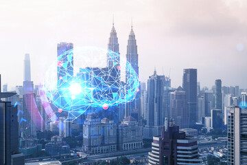 Brain hologram over panorama city view of Kuala Lumpur. KL is the largest science hub in Malaysia, Asia. The concept of developing coding and high-tech science. Double exposure.