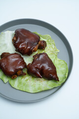 Chinese traditional delicacy marinated pig's feet.Braised pork trotters
