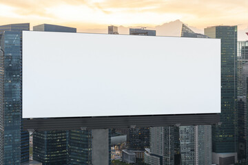 Blank white road billboard with Singapore cityscape background at sunset. Street advertising poster, mock up, 3D rendering. Front view. The concept of marketing communication to sell idea.