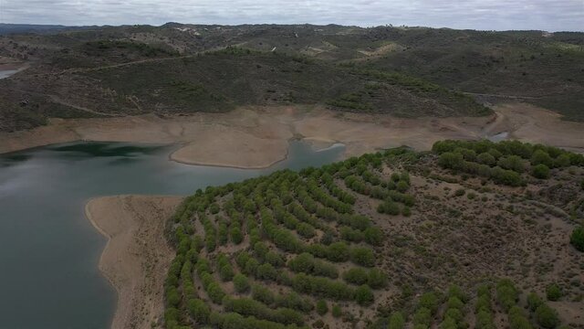 Aerial drone view of Odeleite Dam reservoir in Algarve, Portugal