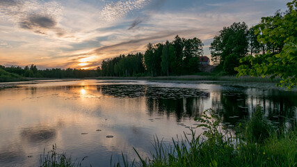 picture with beautiful colorful sunset over the lake, a wonderful place of strength and energy, peace, harmony and quiet