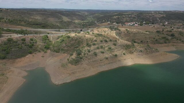 Aerial drone view of Odeleite Dam reservoir in Algarve, Portugal