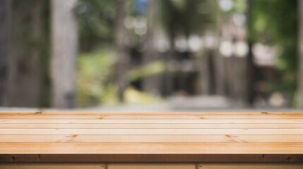 Empty wooden table top with lights bokeh on blur restaurant background. You can mock up your product