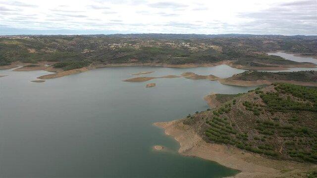 Aerial drone view of Odeleite Dam reservoir in Algarve, Portugal