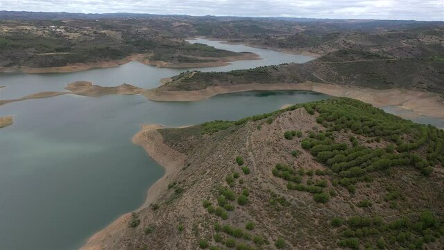 Aerial drone view of Odeleite Dam reservoir in Algarve, Portugal