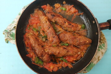 Delicious spicy home made fried kebab with green pepper