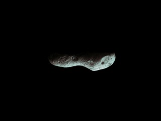 large asteroid with craters in space