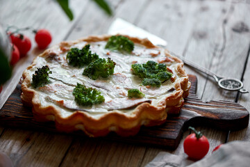 French traditional quiche Lorraine pie with broccoli and salmon
