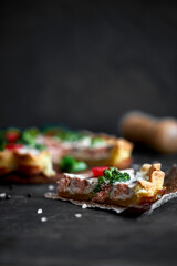 French traditional quiche Lorraine pie with broccoli and salmon