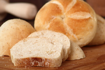 Sliced whole wheat and kaiser bread roll