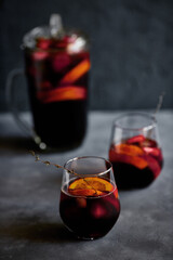 Delicious refreshing sangria. Spanish national drink with oranges, strawberries and ice. Home made production..