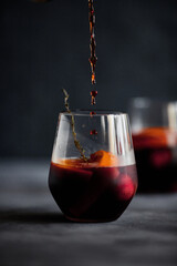 Delicious refreshing sangria. Spanish national drink with oranges, strawberries and ice. Home made production..