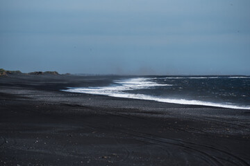 Waves on the beach © AristilisPhotography