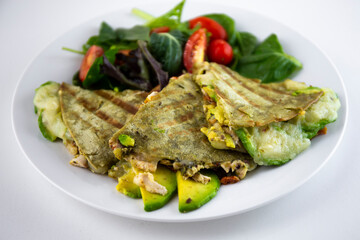 Chicken Quesadilla with avocado, dried tomatoes and jalapeno