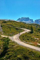 Madonna di Campiglio (Tn), Italy, Cyclist climbing in the mountains