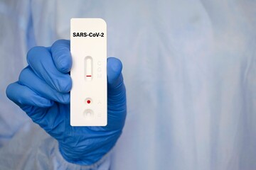 Positive test result by using rapid test for COVID-19, quick fast antibody point of care testing....