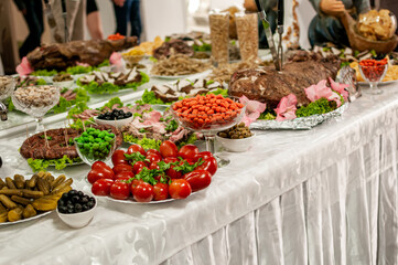 Snack with tomatoes and lettuce and nuts