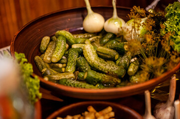 Marinated cucumbers, garlic and dill on a plate