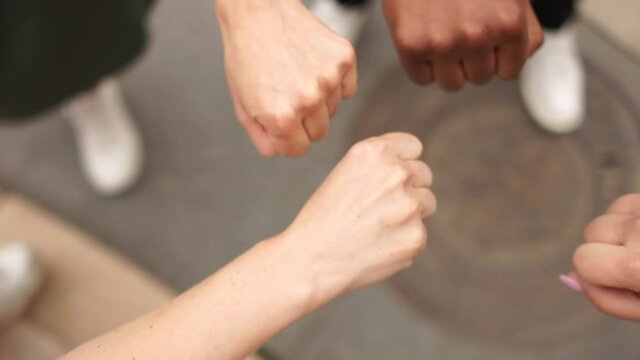 Interracial closed fists, a symbol of unity and solidarity. To support mass protests against racism and violence