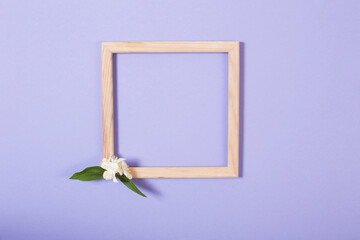 wooden frame with flowers on paper background